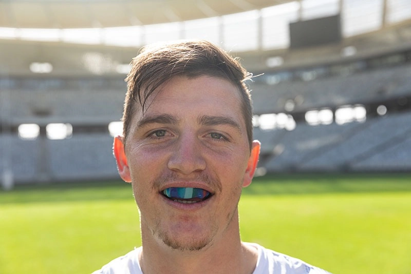 Sports player wearing mouthguard