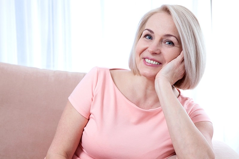 Woman smiling at dentist